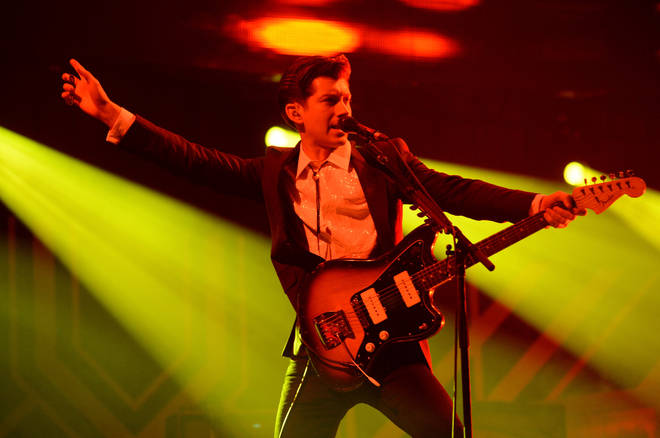 Alex Turner of Arctic Monkeys performs onstage at the 24th Annual KROQ Almost Acoustic Christmas December 2013