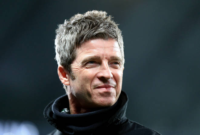 Noel Gallagher is interviewed before the match during the Premier League match between Manchester City and Manchester United at Etihad Stadium on December 07, 2019