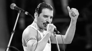 Freddie Mercury performing with Queen at Live Aid, July 1985