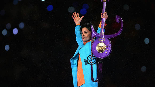 Prince performs during the "Pepsi Halftime Show" at Super Bowl XLI  in 2007