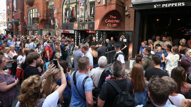 Fans gather to see Paul McCartney at The Cavern Club in 2018