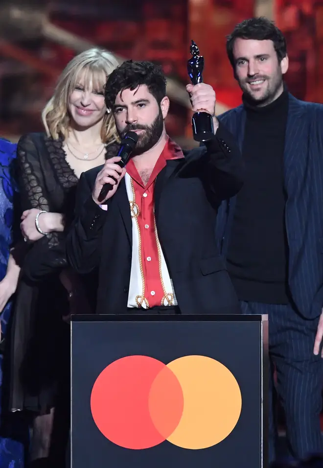 Yannis Philippakis of the band Foals accepts the Best Group award during The BRIT Awards 2020 a