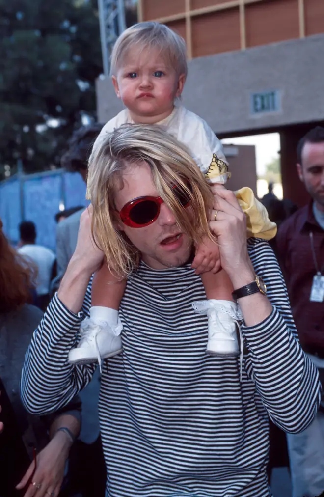Kurt Cobain of Nirvana and daughter Frances Bean Cobain at the MTV Video Music Awards, 1993