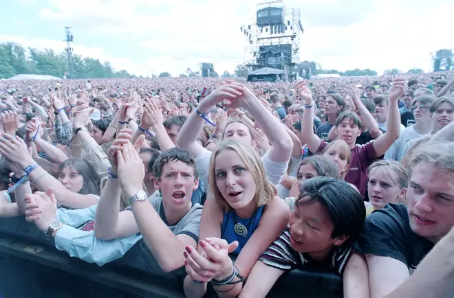 The crowd at Knebworth watch Oasis