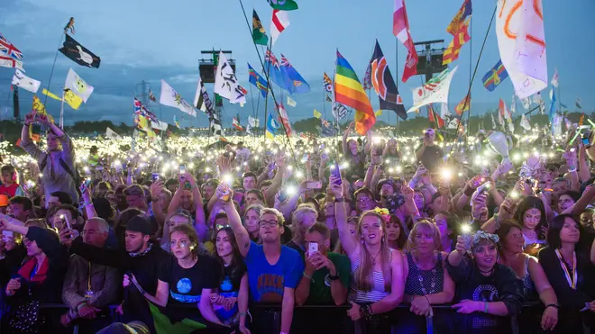 Crowds gather in front of the Pyramid Stage at Glastonbury 2017