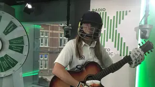 Pippa dressed in full cricket kit