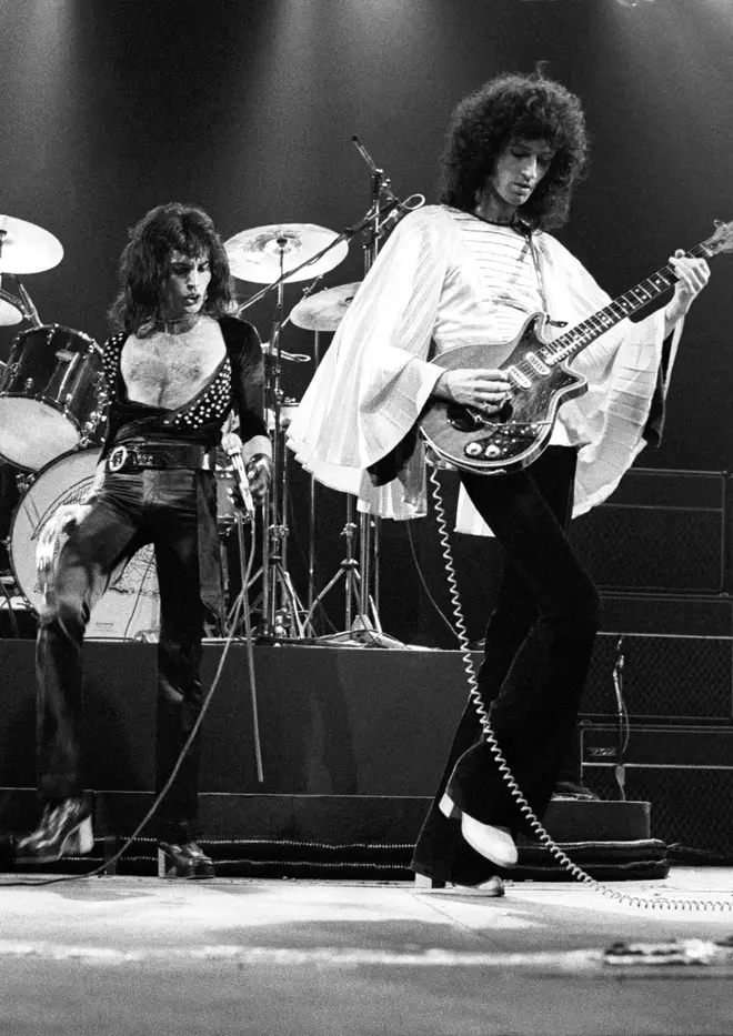 Freddie Mercury and Brian May performing live on stage in 1975
