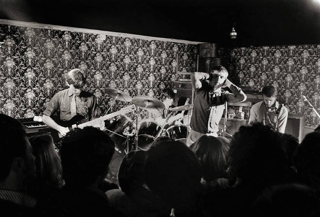 Joy Division in March 1979:  Bernard Sumner, Stephen Morris, Ian Curtis, Peter Hook performing live onstage at Bowdon Vale Youth Club