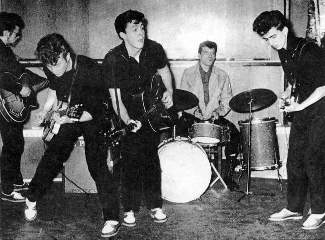 The Silver Beatles: Stu Sutcliffe, John Lennon, Paul McCartney, Johnny Hutch and George Harrison on stage in 1960 in Liverpool England. T