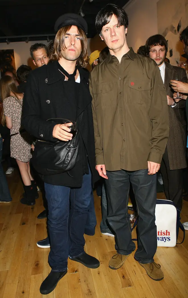 Liam Gallagher joins Stone Roses man John Squire at his gallery launch; in the background, a stunned Gordon Smart seeks solace in his nice coat