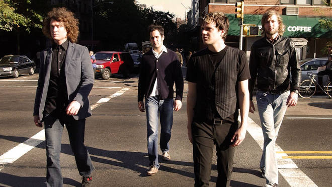The Killers in 2004: Dave Keuning, Ronnie Vannucci, Brandon Flowers and Mark Stoermer