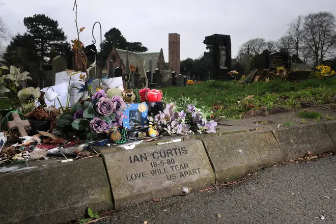 The memorial stone for Ian Curtis at Macclesfield Cemetery