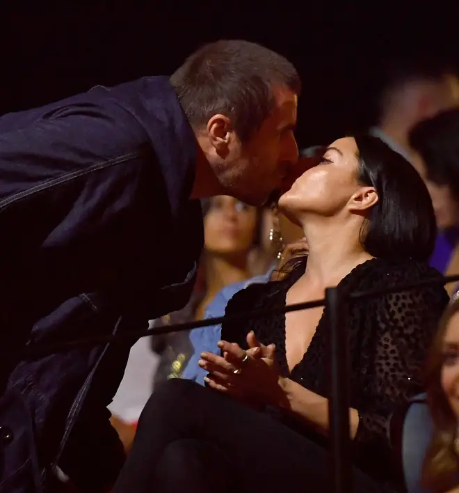 Liam Gallagher kisses Debbie Gwyther at the 2019 MTV EMA's