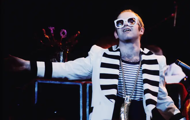 Elton John performs in London around 1975
