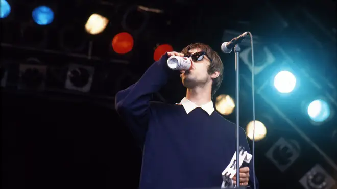 Liam Gallagher of Oasis performs on stage at Glastonbury, 26 June 1994