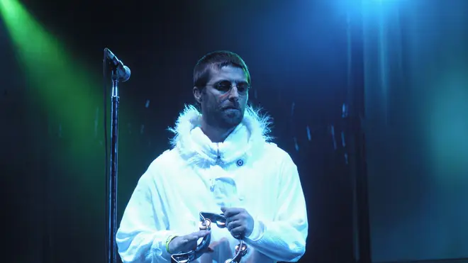 Liam Gallagher performing with Oasis at Glastonbury 2004