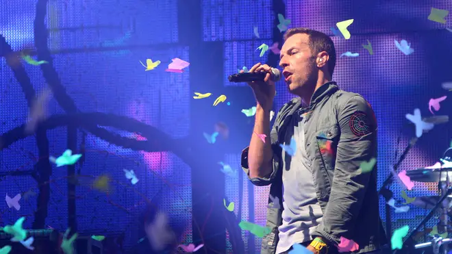 Chris Martin of Coldplay performs at Glastonbury 2011
