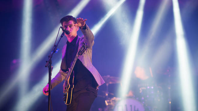 Alex Turner of Arctic Monkeys performing live at Glastonbury 2013