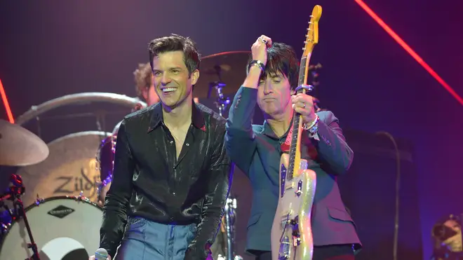 Johnny Marr performs with Brandon Flowers of The Killers at Glastonbury 2019