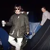 It doesn't matter if your band is headlining the Pyramid Stage, you still have to navigate those guy ropes. Liam Gallagher at Glastonbury 1995