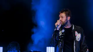 Tom Meighan from Kasabian performs in 2018