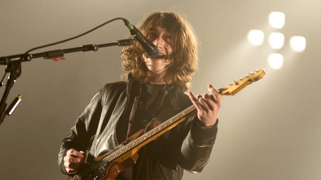 Alex Turner of Arctic Monkeys performing live at Wembley Arena on the 17th November 2009
