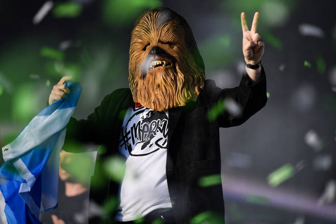 Lewis Capaldi comes on stage wearing a Chewbacca mask to perform on the main stage during the TRNSMT Festival at Glasgow Green on July 14, 2019