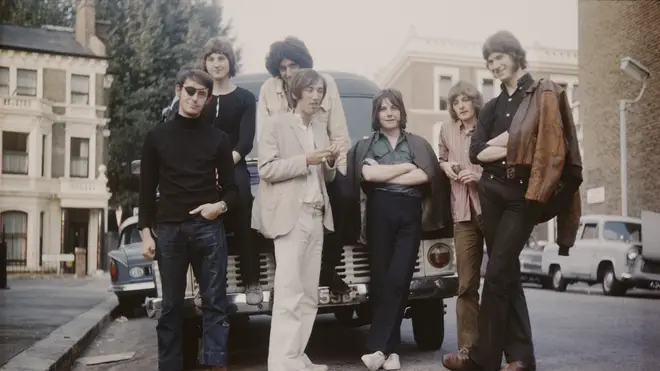 Smile in 1969, before the arriva of Roger Taylor:  Bruce Sanderson (with eye patch), Paul Humbertone, Brian May (sitting on bonnet), Pete Edmunds, Tim Staffell, Clive Armitage and Paul Fielder.
