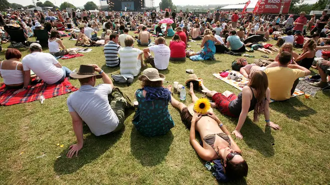 Fans kick back on the second day of the Isle Of Wight festival 2007.