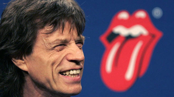 Mick Jagger announces the Stones will play that Half Time Show at the Superbowl in 2006... while the band's logo looks on