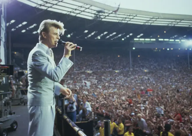 David Bowie performing at the Live Aid concert at Wembley Stadium in London, 13th July 1985. T