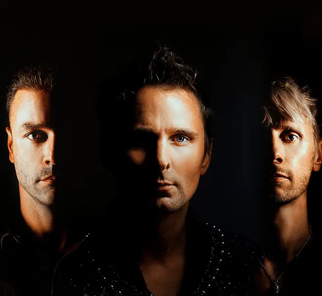 Muse members Chris Wolstenholme, Matt Bellamy and Dominic Howard press image
