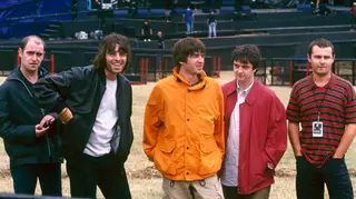 Oasis before their show at Knebworth, August 1996: aul 'Bonehead' Arthurs, Liam Gallagher, Noel Gallagher, Paul 'Guigsy' McGuigan and Alan White