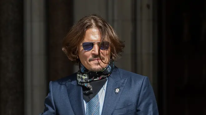 Johnny Depp arrives at the Royal Courts of Justice on day fourteen of the hearing on the libel case against The Sun newspaper on 24 July, 2020