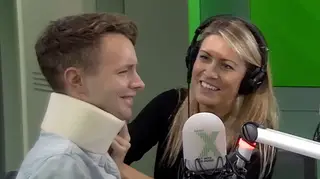 Pippa puts a a neck brace on James on The Chris Moyles Show