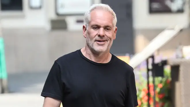 Chris Moyles walks to Global in Leicester square