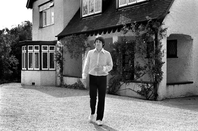 Beatles singer Paul McCartney relaxing in the grounds of his father's home in Gayton in the Wirral, Cheshire, July 1968