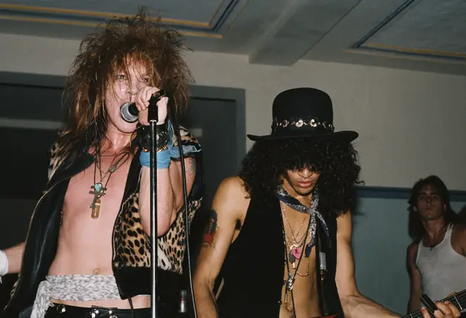 21 July 1985: Axl Rose and Slash of the rock band "Guns n&squot; Roses" perform onstage at a UCLA frat party.