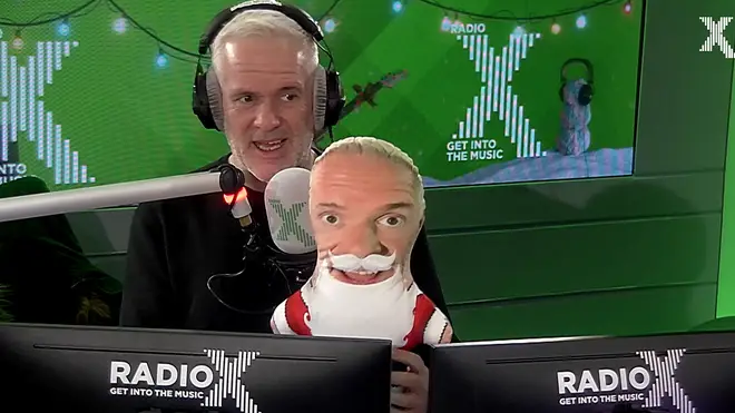 Chris Moyles holds a stuffed toy version of himself