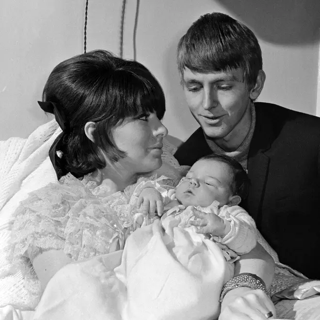 Tara Browne with his wife Noreen MacSherry captured by the press at the birth of their son Dorian in March 1965