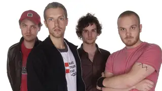 Coldplay in November 2002: Jonny Buckland, Chris Martin, Guy Berryman, and Will Champion
