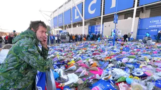 Kasabian frontman Tom Meighan visits the floral tributes outside King Power Stadium to former owner Vichai Srivaddhanaprabha in October 2018