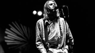 Kurt Cobain performing live onstage with Nirvana at Palasport, Modena on 21 February 1994