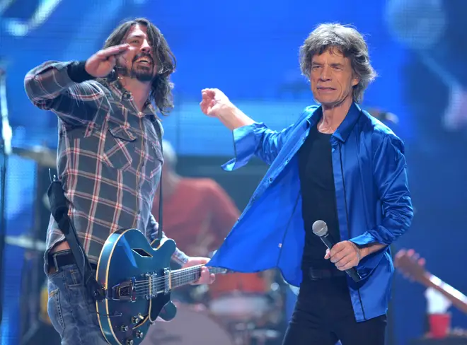 Dave Grohl joins Mick Jagger and the rest of the Stones onstage in 2013
