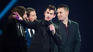 Alex Turner and his fellow Monkeys at the BRIT Awards, 19 February 2014