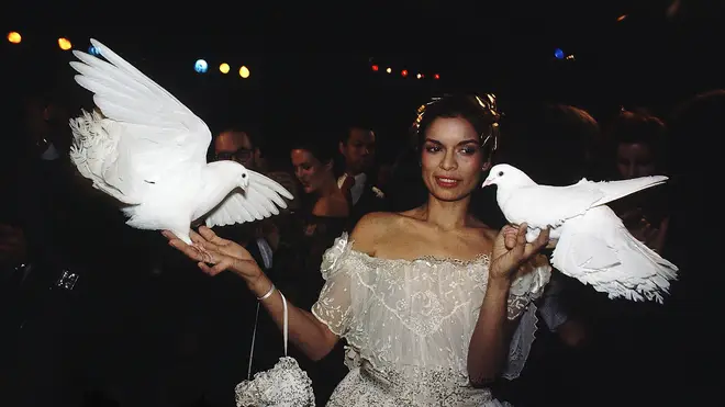 Bianca Jagger releasing white doves at Studio 54