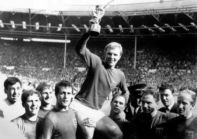 Bobby Moore holds aloft the Jules Rimet trophy as England win the World Cup in 1966