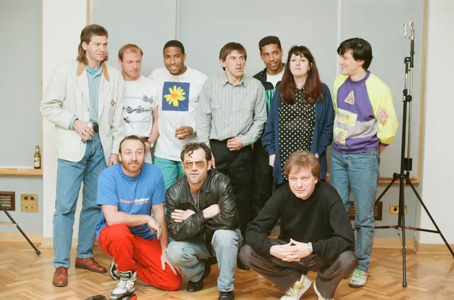 Some of New Order (and Tony Wilson and Keith Allen) recording World In Motion with some of the 1990 England squad: Steve McMahon, Chris Waddle, Peter Beardsley, John Barnes and Des Walker