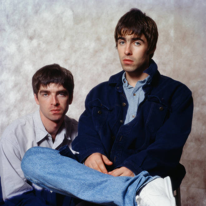 Noel Gallagher and Liam Gallagher of Oasis, at a photoshoot in a hotel in Tokyo, September 1994