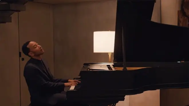John Legend performs a song on Master of None